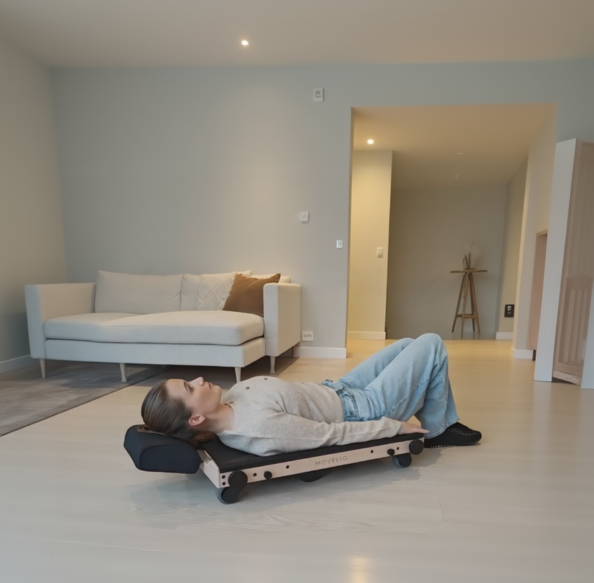 Movelio Bed Roller used in a relaxed position at home