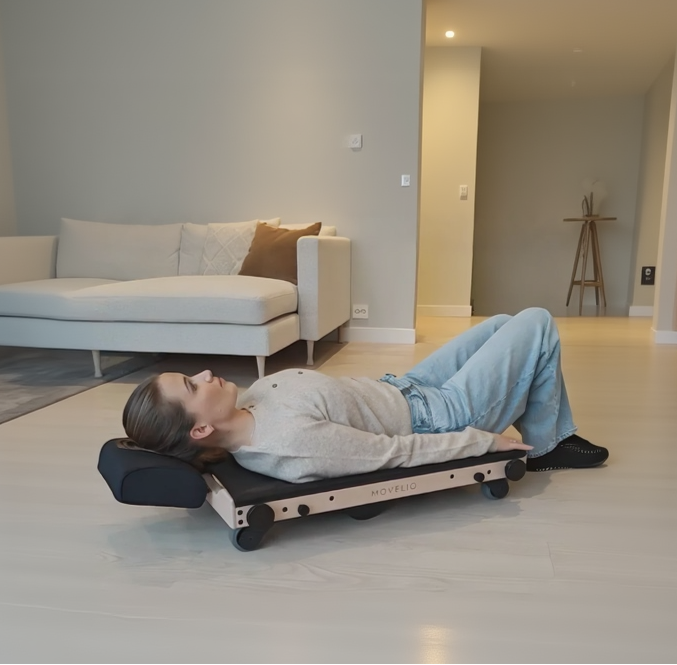 Movelio Bed Roller used in a relaxed position at home